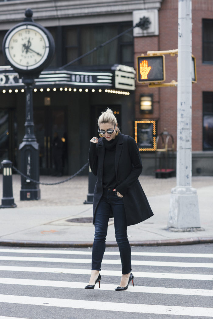 Black Zara Vest over black Uniqlo Sweater with black l'agence jeans and Ben Amun Earring 4