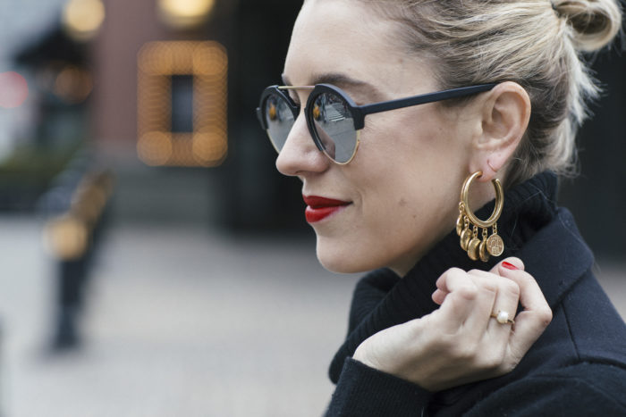 Black Zara Vest over black Uniqlo Sweater with black l'agence jeans and Ben Amun Earrings 9