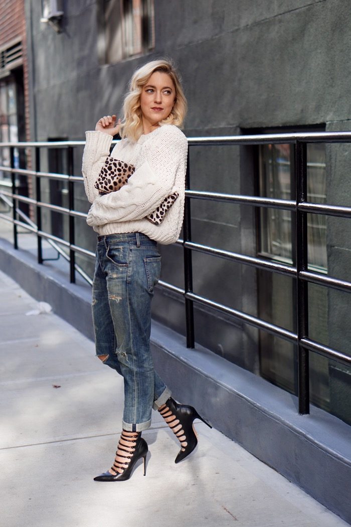 christine-cameron-of-my-style-pill-wears-a-cream-chenille-sweater-two-ways-paired-with-black-strappy-schutz-heels-and-boyfriend-jeans-1